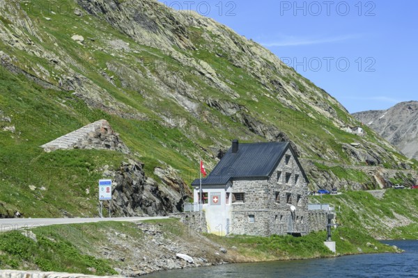 View of historic Swiss border building Border station former checkpoint for passport control Passport control Border control Passenger control Customs at road crossing National border State border Italy and Switzerland on the shore of Lac du Grand St-Bernard, Great Saint Bernard Pass, Colle del Gran San Bernardo, Col du Grand Saint Bernard, Valais, Switzerland