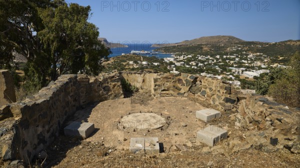 Base of an anti-aircraft battery, Base of an anti-aircraft battery, overlooking a village and the sea, surrounded by dry vegetation, Italian anti-aircraft position, Ground defence position, PL306 with 6 guns, WW2, Vigla Mountain, Vigla, above Lakki, Lakki, Leros, Dodecanese, Girech Islands, Greece