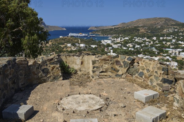 Base of an anti-aircraft battery, overlooking a village and the sea, surrounded by dry vegetation, Italian anti-aircraft position, ground defence position, PL306 with 6 guns, WW2, Vigla Mountain, Vigla, above Lakki, Lakki, Leros, Dodecanese, Girech Islands, Greece