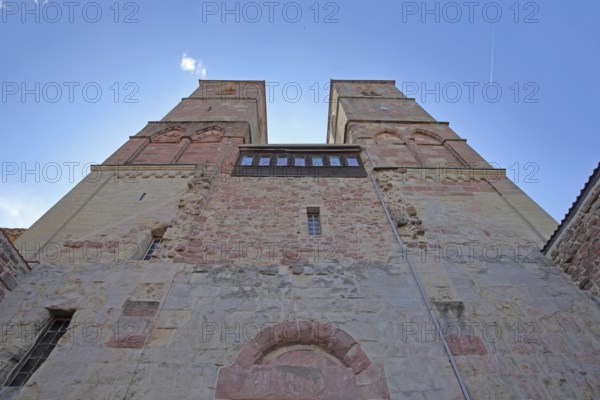 Romanesque St. Mary's Collegiate Church with twin towers, view upwards, perspective, church ruins, museum, Veßra Monastery, cobblestone, Thuringia, Germany