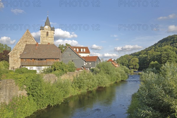 St Bartholomew's Church and Werra, banks, houses, idyll, Werra valley, river landscape, Themar, cobblestone, Thuringia, Germany