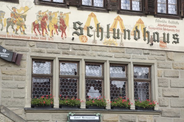 Historic Hotel Schlundhaus, monument to the entry of the Swedish King Gustav II Adolf into Schmalkalden in 1651, mural painting, town history, inscription, window, house facade, invasion, conquest, Swedish king, equestrian figures, equestrian figure, horse figure, knight, Schlundhaus, market square, Bad Königshofen, Rhön, Lower Franconia, Franconia, Bavaria, Germany