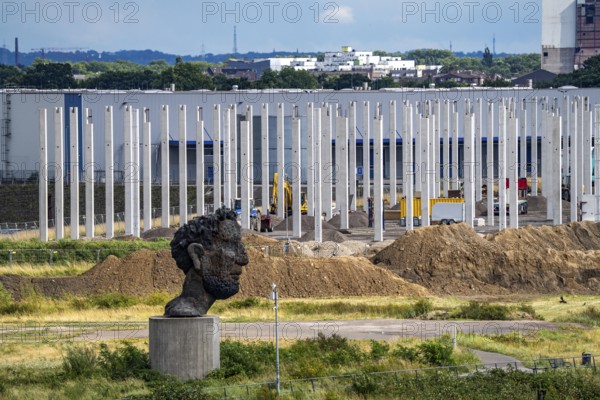 Construction of a new logistics hall on the Mercatroinsel, Hall 2, next to an existing hall, approx. 25, 000 square metres in size, in Duisburg-Ruhrort, shell construction, sculpture The Echo of Poseidon on the Rhine, North Rhine-Westphalia, Germany