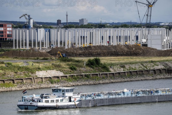 Construction of a new logistics hall on the Mercatroinsel, Hall 2, next to an existing hall, approx. 25, 000 square metres in size, in Duisburg-Ruhrort, shell construction, tanker on the Rhine, North Rhine-Westphalia, Germany