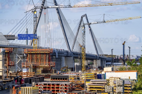 Construction site on the left bank of the Rhine for the new construction of the second motorway bridge of the A1 over the Rhine near Leverkusen, after completion of the first bridge, the old one was demolished, the second part of the bridge, for a total of 8 lanes, is currently being rebuilt at the same location, Leverkusen, North Rhine-Westphalia, Germany