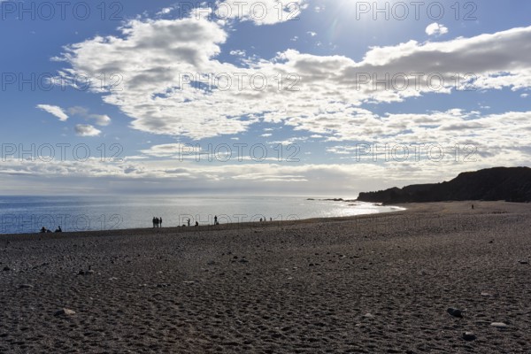 Black pebble beach Djúpalónssandur, Djupalonssandur, volcanic landscape, coastline, sunbeams, Hellnar, Snæfellsnes peninsula, Snaefellsnes, West Iceland, Iceland