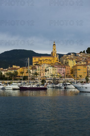 Town with colourful houses by the sea, sunrise, Menton, Alpes Maritimes, Provence Alpes Cote d'Azur, French Riviera, South of France, France
