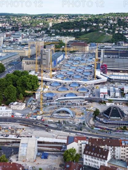 Stuttgart Central Station. The Stuttgart 21 construction site, where the new through station is being built. The 27 skylights that naturally illuminate the future through station are a characteristic feature. On the right are the current platforms of the current terminus station, at the front left the south surge structure for the ventilation of the underground platform hall. Stuttgart, Baden-Württemberg, Germany