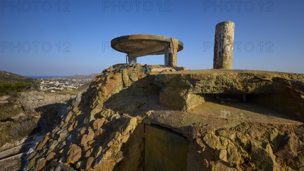 An old, dilapidated concrete building on a hill with a sea backdrop, Lost Place, Lago anti-aircraft battery, bunker, Apitiki Mountain, Leros, Dodecanese, Greek Islands, Greece