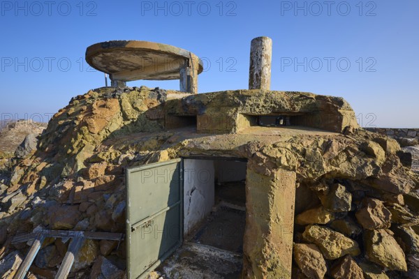 Abandoned bunker-like structure with rock walls and sky in the background, Lost Place, Lago anti-aircraft battery, bunker, Apitiki Mountain, Leros, Dodecanese, Greek Islands, Greece