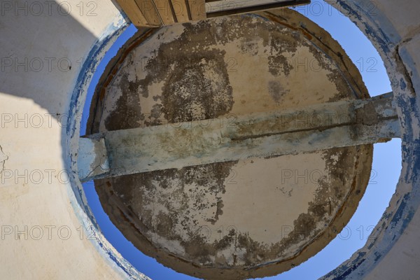 View from below of a dilapidated round roof structure with open sky, Lost Place, Lago anti-aircraft battery, bunker, Apitiki Mountain, Leros, Dodecanese, Greek Islands, Greece