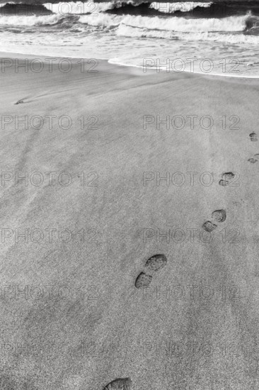Path to the sea, Skarðsvík Beach, footprints, shoe prints on the sandy beach, coastal landscape, monochrome, symbolic image, Skardsvik, Snaefellsnes, West Iceland, Iceland