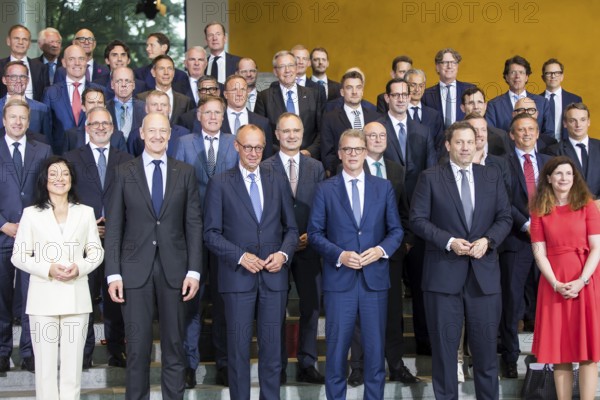 Group photo of the Made for Germany Investment Summit, including in the first row Katherina Reiche (CDU, Federal Minister for Economic Affairs and Energy), Roland bush (CEO of Siemens), Friedrich Merz (CDU, Federal Chancellor), Christian Sewing (CEO of Deutsche Bank), Lars Klingbeil (SPD, Federal Minister of Finance, Vice Chancellor and SPD Federal Chairman) and Bettina Orlopp (CEO of Commerzbank) . The Made for Germany investment summit aims to strengthen Germany as a business location. To this end, representatives from a total of 61 German companies meet with Chancellor Merz in the Federal Chancellery, Berlin, 21 July 2025