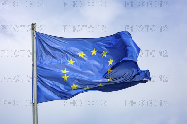 Düsseldorf, North Rhine-Westphalia, Germany - European flag fluttering in the wind on the flagpole, symbolic image of EUROPA