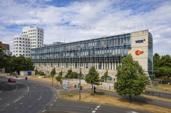 Düsseldorf, North Rhine-Westphalia, Germany - Düsseldorf broadcasting centre with the television stations WDR and ZDF, next to the Gehry buildings at the new Zollhof in the Media Harbour