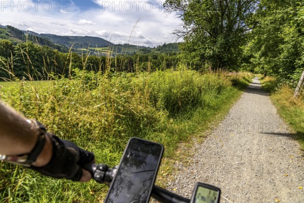 Sauerlandring cycle path, an 84 km long circular cycle path between the towns of Finnentrop, Eslohe, Schmallenberg and Lennestadt, mostly on former railway lines, here near Schmallenberg, Sauerland, North Rhine-Westphalia, Germany