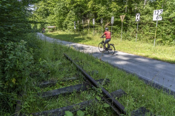 Sauerlandring cycle path, an 84 km long circular cycle path between the towns of Finnentrop, Eslohe, Schmallenberg and Lennestadt, mostly on former railway lines, here near Finnentrop-Serkenrode, old railway traffic signs, Sauerland, North Rhine-Westphalia, Germany