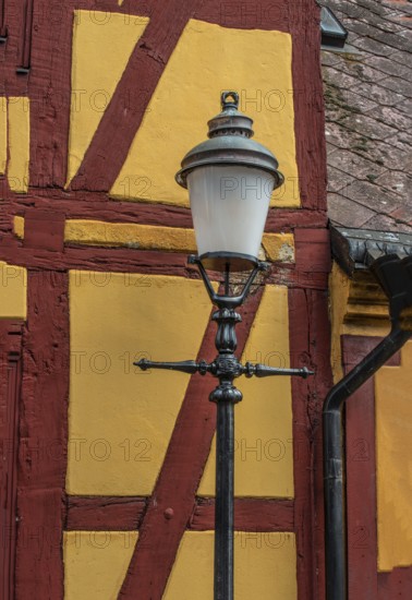 Old street lamp at a half timbered wall in Ystad, Skåne county, Sweden, Scandinavia