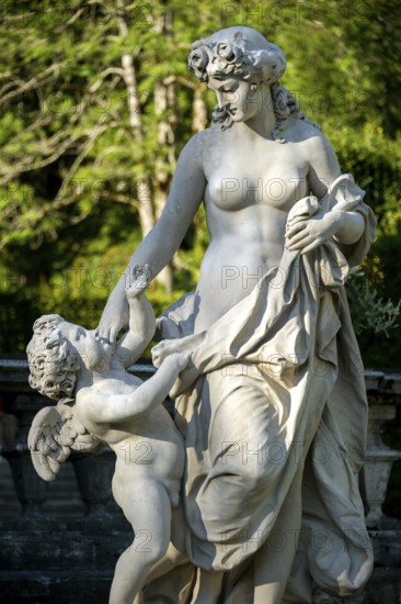 Venus and Cupid, decorative female statue with putti, terraced gardens, palace gardens of Linderhof Palace, UNESCO World Heritage Site, Ettal, Unterammergau, Garmisch-Partenkirchen, Upper Bavaria, Bavaria, Germany