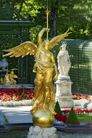 Fountain figure of the goddess Fama with fanfare in gold, Rococo style, west parterre, palace park of Linderhof Palace, UNESCO World Heritage Site, Ettal, Unterammergau, Garmisch-Partenkirchen, Upper Bavaria, Bavaria, Germany