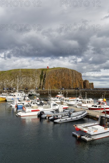 Boats in the harbour, cliffs, Stykkisholmur, Snæfellsnes, Snaefellsnes, West Iceland, Iceland