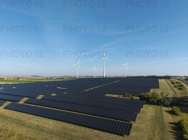Renewable energy sources with solar and wind systems on an extensive field, near Kitzingen, Lower Franconia, Bavaria, Germany