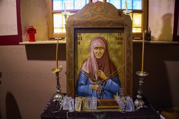 Icon of Panagia Kyra, Religious icon with candles and decorations in a warmly lit interior, Pandeli Castle, Castle, Leros Fortress, St John's Fortress, Apitiki Hill, Pandeli Bay, Agia Marina, Leros, Dodecanese, Greek Islands, Greece