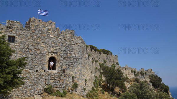 Greek flag flies over Stone Castle, Pandeli Castle, Castle, Leros Fortress, St John's Fortress, Apitiki Hill, Pandeli Bay, Agia Marina, Leros, Dodecanese, Greek Islands, Greece