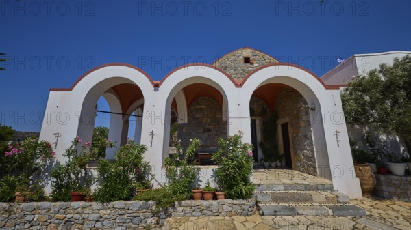 Panagia Kyra Church, Panagia tou Kastrou, Small church with striking arches and flowerbeds against a clear blue sky, Pandeli Castle, Castle, Leros Fortress, St John's Fortress, Apitiki Hill, Pandeli Bay, Agia Marina, Leros, Dodecanese, Greek Islands, Greece