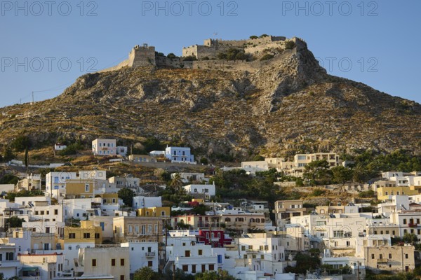 Hill with old castle above a town of white and pastel-coloured houses, Pandeli Castle, Castle, Leros Fortress, St John's Fortress, Apitiki Hill, Pandeli Bay, Agia Marina, Leros, Dodecanese, Greek Islands, Greece