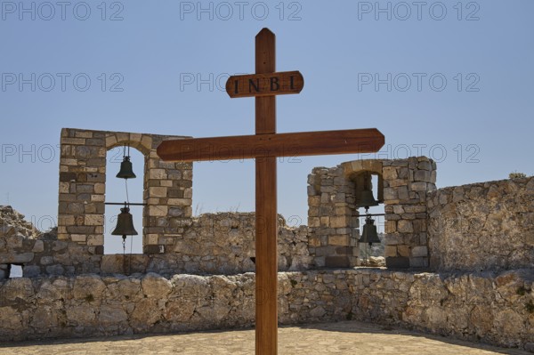 Wooden cross in front of stone bell windows, Pandeli Castle, Castle, Leros Fortress, St John's Fortress, Apitiki Hill, Pandeli Bay, Agia Marina, Leros, Dodecanese, Greek Islands, Greece