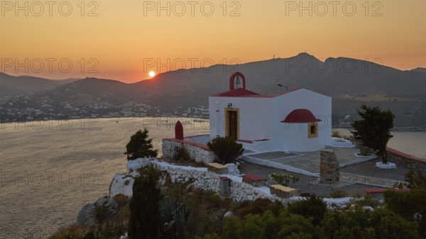 Chapel on a cliff at sunset with a view of the coast and mountains, Profitis Ilias Church, Prophet Elias Church, evening light, sunset, Ormos Alintas, Agia Marina, Leros, Dodecanese, Greek Islands, Greece