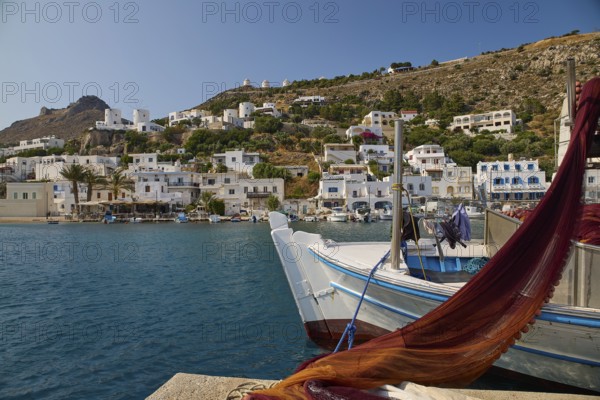 Harbour with fishing boats and white houses surrounded by blue water, Pandeli Castle, Castle, Leros Fortress, St John's Fortress, Apitiki Hill, Pandeli Bay, Windmills, Leros, Dodecanese, Greek Islands, Greece