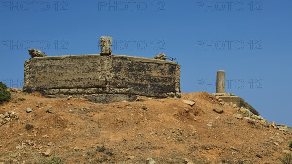 Abandoned concrete structure on a dry hill under a clear sky, Lost Place, Air Defence Position, Aerophone, Parabolic Acoustic Mirror, Patella Mountain, WW2, west of Lakki, Leros, Dodecanese, Greek Islands, Greece