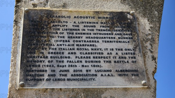 Memorial plaque on a concrete structure with historical information, Lost Place, Air Defence Position, Aerophone, Parabolic Acoustic Mirror, Patella Mountain, WW2, west of Lakki, Leros, Dodecanese, Greek Islands, Greece
