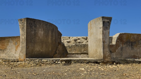 Weathered concrete wall structures in dry environment under blue sky, Lost Place, Air Defence Position, Aerophone, Parabolic Acoustic Mirror, Patella Mountain, WW2, west of Lakki, Leros, Dodecanese, Greek Islands, Greece