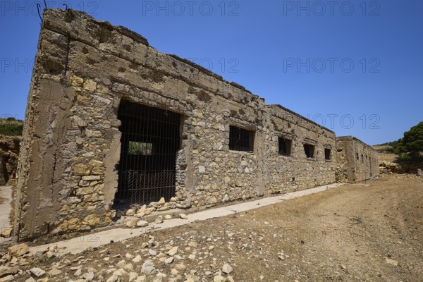 Stone building with several windows in a dry environment under a blue sky, Lost Place, Air Defence Position, Aerophone, Parabolic Acoustic Mirror, Patella Mountain, WW2, west of Lakki, Leros, Dodecanese, Greek Islands, Greece