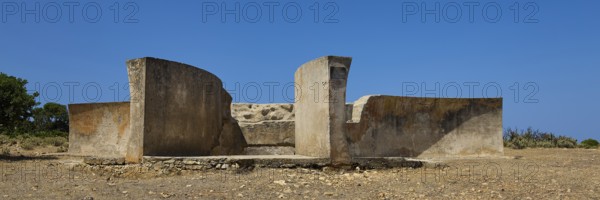 Old concrete ruins under a clear blue sky in an arid landscape, Lost Place, Air Defence Position, Aerophone, Parabolic Acoustic Mirror, Patella Mountain, WW2, west of Lakki, Leros, Dodecanese, Greek Islands, Greece