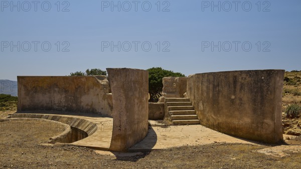 Concrete ruin with stairs and open walkway under clear sky, Lost Place, Air Defence Position, Aerophone, Parabolic Acoustic Mirror, Patella Mountain, WW2, west of Lakki, Leros, Dodecanese, Greek Islands, Greece
