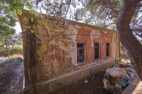 Lost Place, Old abandoned building with broken windows and surrounding nature, Radio Station, WW2, Agios Nikolaos Radio, Agia Marina, Leros, Dodecanese, Greek Islands, Greece