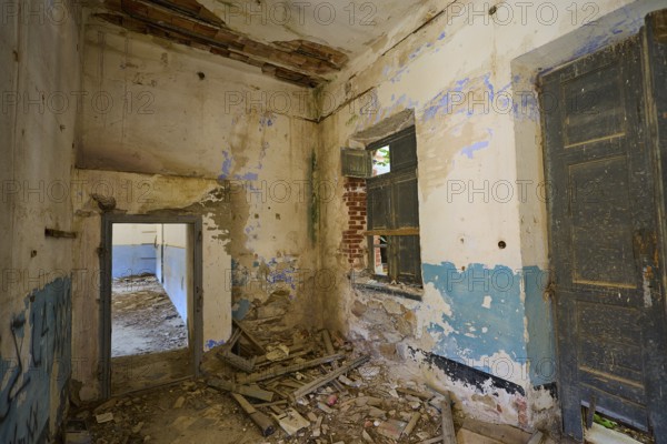 Lost Place, Dilapidated interior with rubble and crumbling walls, windows and old doors visible, Radio Station, WW2, Agios Nikolaos Radio, Agia Marina, Leros, Dodecanese, Greek Islands, Greece