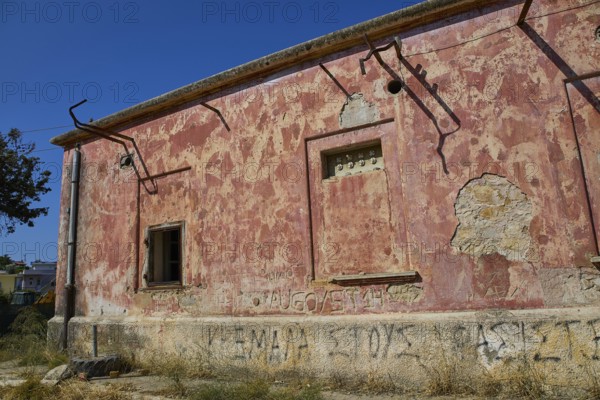 Lost Place, Dilapidated building with red walls, graffiti and a window under a blue sky, Radio Station, WW2, Agios Nikolaos Radio, Agia Marina, Leros, Dodecanese, Greek Islands, Greece