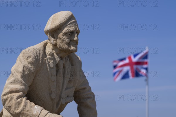 Union Jack, British flag, sculpture by Bill Pendell MM, British World War II veteran, looking back at himself in the Battle of Gold Beach, D-Day 75 garden, also Le Jardin du Souvenir, D-Day, Operation Overlord, Mulberry B, Mulberry Harbour, Gold Beach, beach, Port Winston, Arromanches-les-Bains, Normandy, Calvados, France
