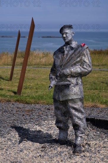 Sculpture by Bill Pendell MM, British World War II veteran, looking back at himself in the Battle of Gold Beach, D-Day 75 garden, also Le Jardin du Souvenir, D-Day, Operation Overlord, Mulberry B, Mulberry Harbour, Gold Beach, beach, Port Winston, Arromanches-les-Bains, Normandy, Calvados, France