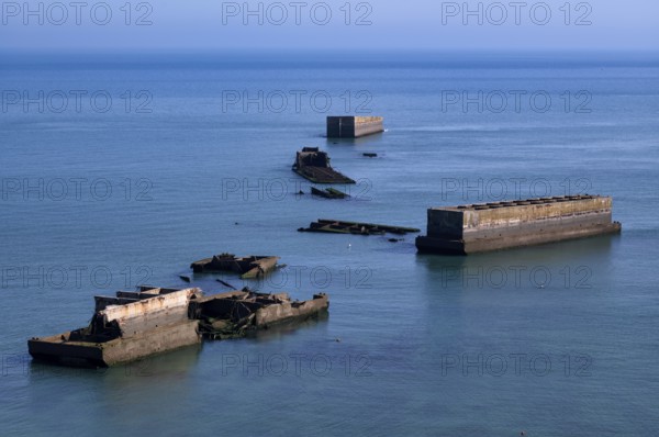 Phoenix Caissons, concrete boxes, caissons, were used in the sea as breakwaters and to form an improvised harbour, Mulberry B Harbour, Mulberry Harbour, Port Winston, Gold Beach, beach, D-Day, Operation Overlord, Arromanches-les-Bains, Normandy, Calvados, France