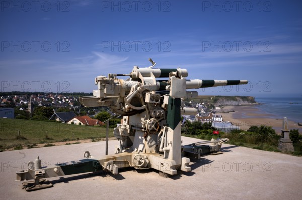 German 8, 8 cm gun, cannon, anti-aircraft gun, behind it Phoenix Caissons, caissons, concrete boxes, were used in the sea as breakwaters and to form an improvised harbour, Mulberry B Harbour, Mulberry Harbour, Port Winston, Gold Beach, beach, D-Day, Operation Overlord, Atlantic Wall, Arromanches-les-Bains, Normandy, Calvados, France