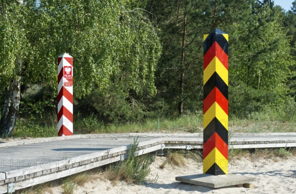 Pedestrian and cycle path with German and Polish border posts along the German-Polish border near Ahlbeck, Usedom Island, Mecklenburg-Western Pomerania, Germany