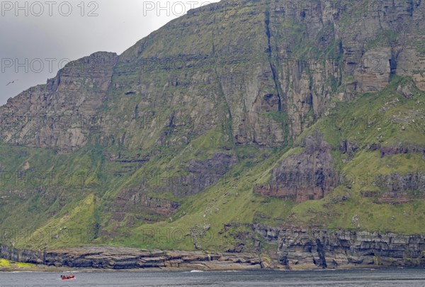 High cliffs next to a calm sea look imposing and majestic, Hoy, Orkney Islands, Scotland, Great Britain
