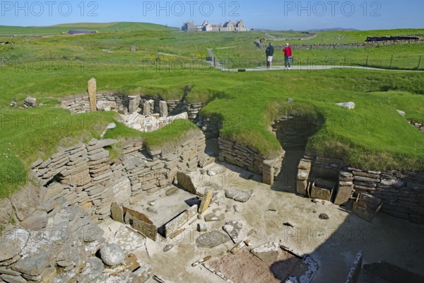 Wide view of an archaeological site with ruins in grassy landscape, Skara Brae, Neolithic settlement, Mainland, Orkney Islands, Scotland, Great Britain