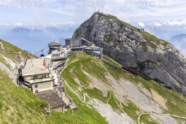 Mount Pilatus Mountain summit with cable car and cog railway in the Swiss Alps in Pilatus, Switzerland